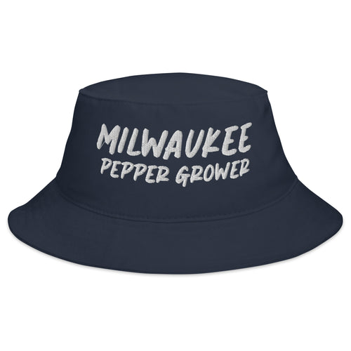 Navy bucket hat with 'Milwaukee Pepper Grower' text on a white background